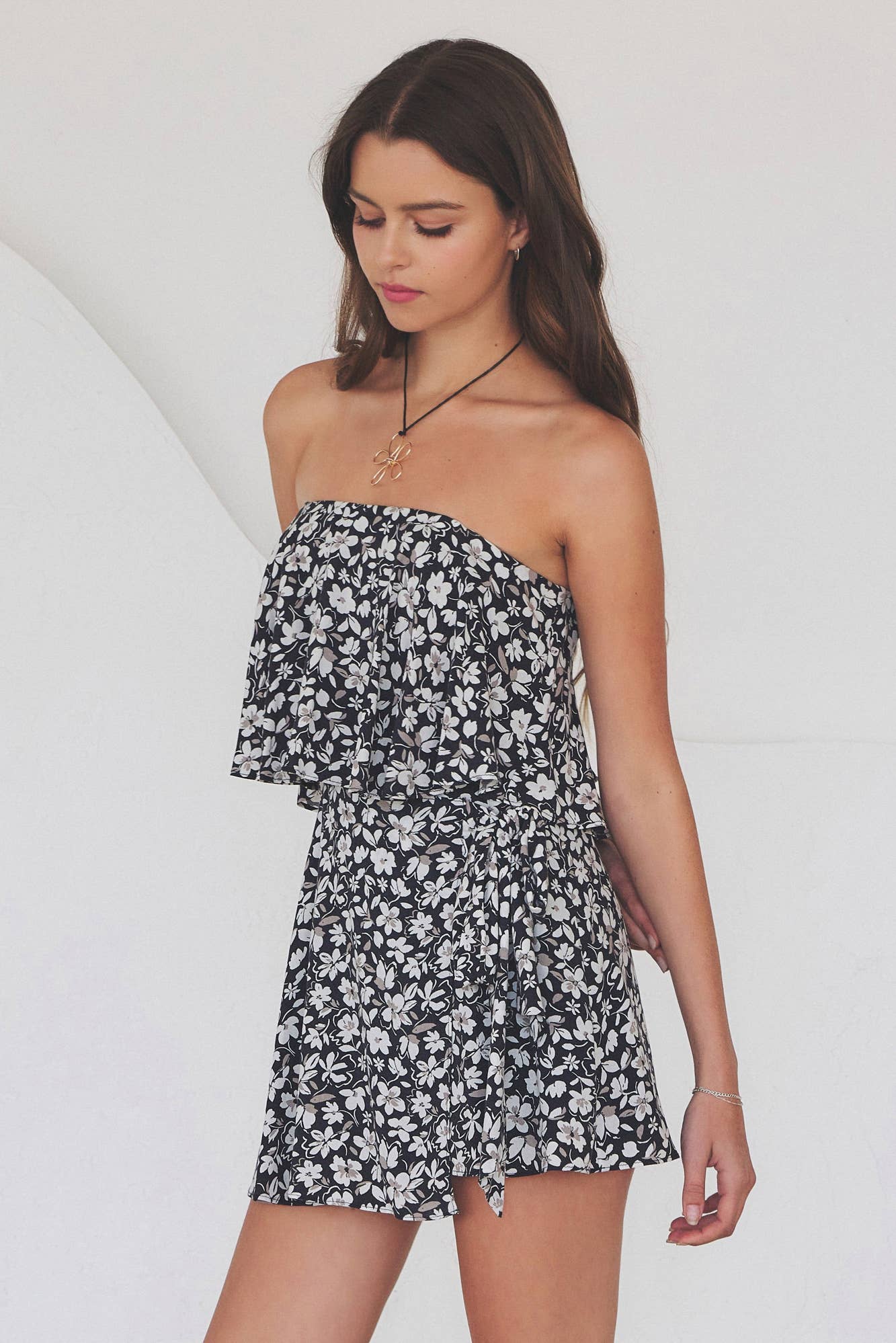 SLEEVELESS RUFFLE WRAP PRINTED ROMPER