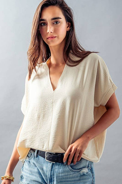 OVERSIZED VNECK FOLDED SHORT SLEEVE TOP